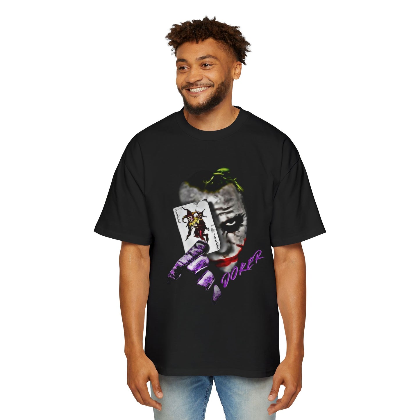 Man wearing a black t-shirt with a joker graphic design of a Joker card and face.
