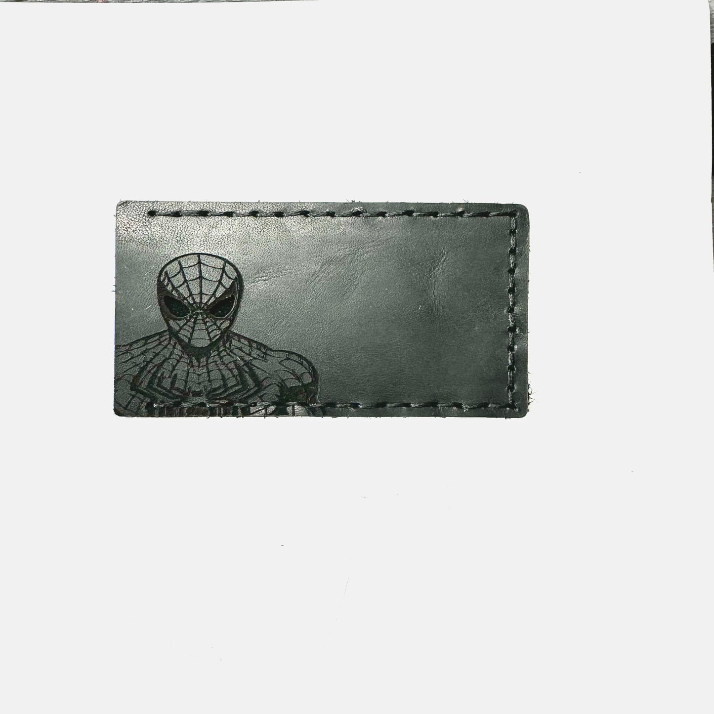 black leather wallet with a spider-Man design front