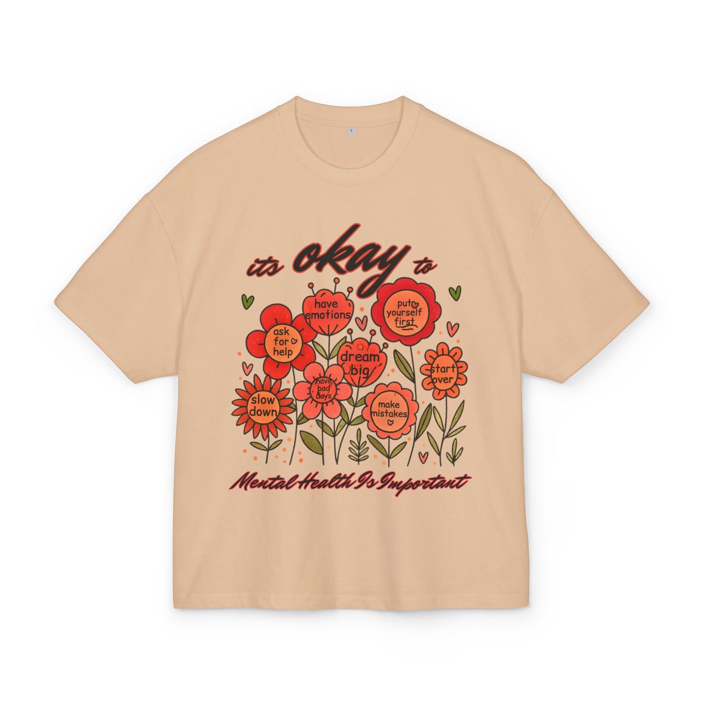 Beige t-shirt with red floral design and motivational text on a white background