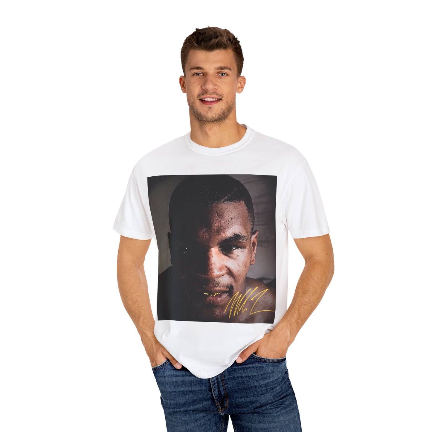 Man wearing a white t-shirt with a graphic of a face and signature of mike tyson
