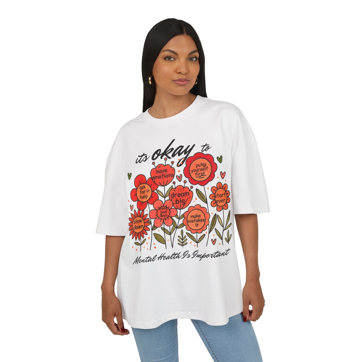 Woman wearing a white t-shirt with floral design and text on a white background