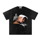 Black t-shirt with a graphic of the rapper 2pac and 'Tupac' text on a white background