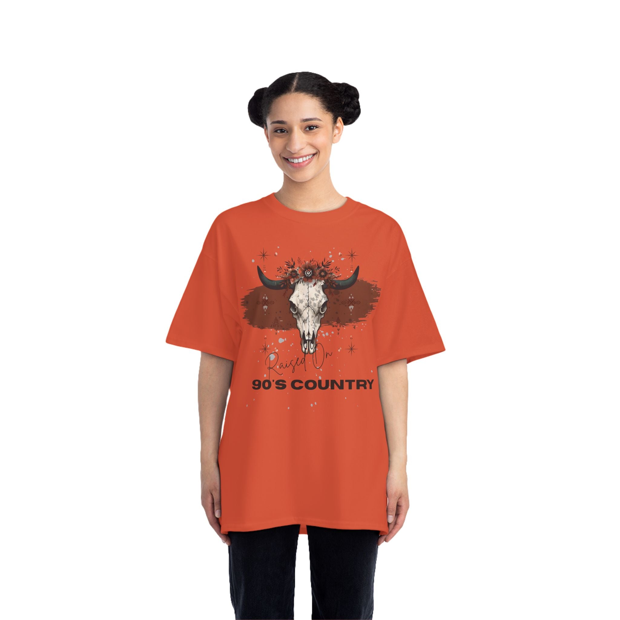 Person wearing an orange t-shirt with a bull skull graphic and '90s Country' text on a white background