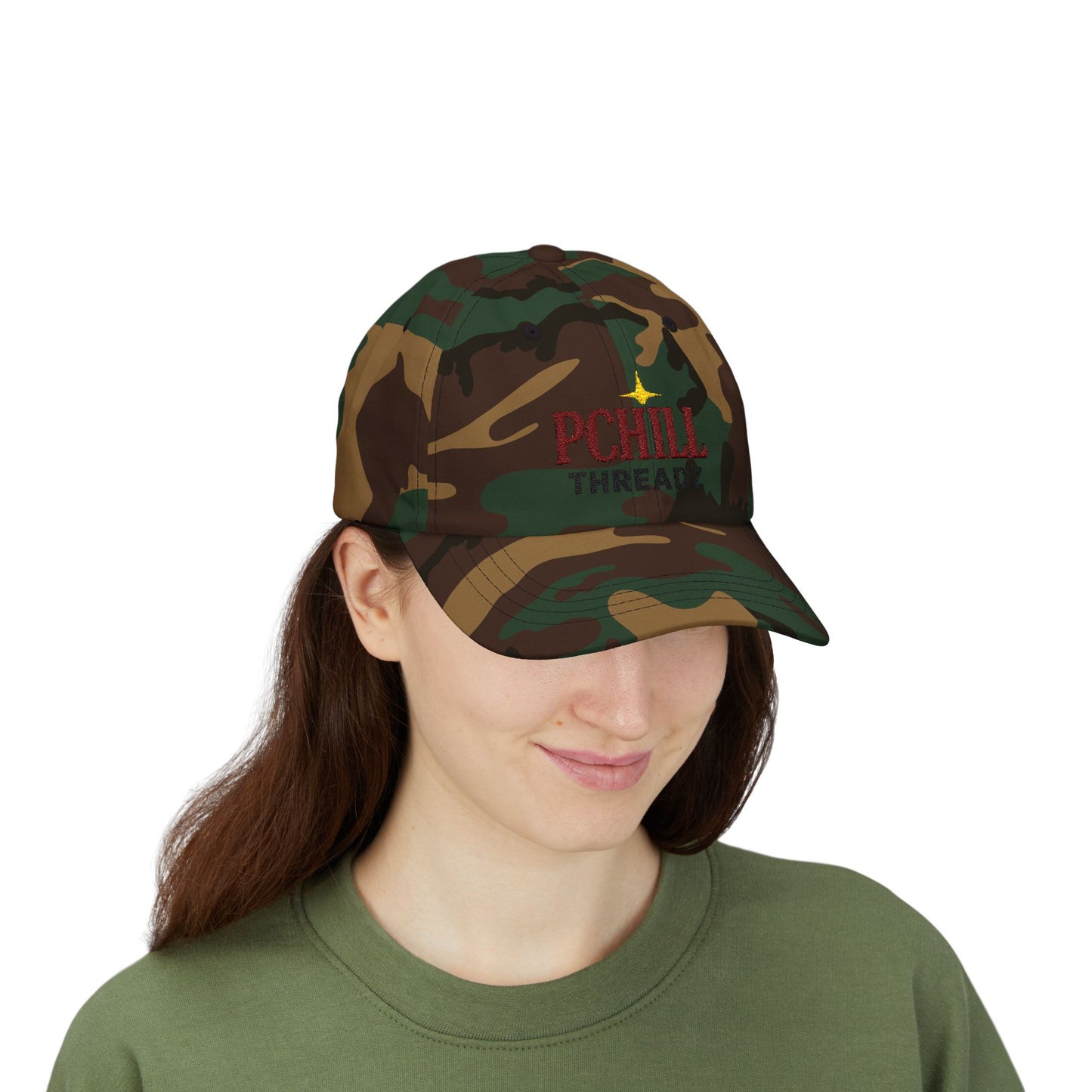 Person wearing a camouflage cap with 'PCHILL THREADS' logo on a white background