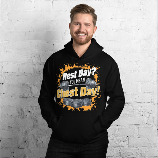 Smiling man wearing black "Rest Day? You Mean Chest Day!" fitness hoodie with weightlifting graphic