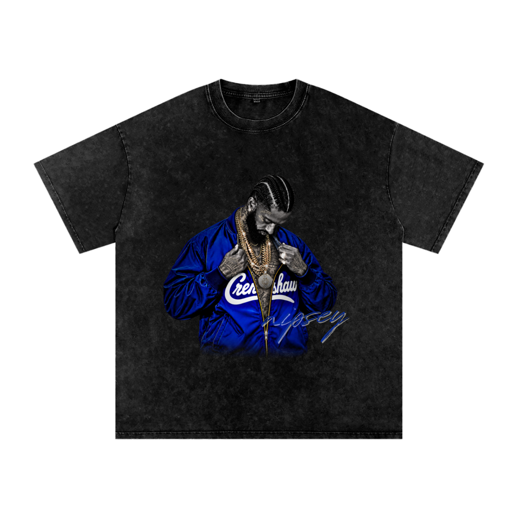 Black snow-washed oversized T-shirt featuring Nipsey Hussle with cornrows, gold chains and a vivid blue Crenshaw jacket with signature-style lettering.