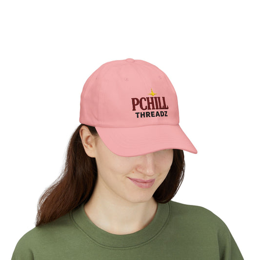 Person wearing a pink cap with 'PChill Threadz' logo on a white background
