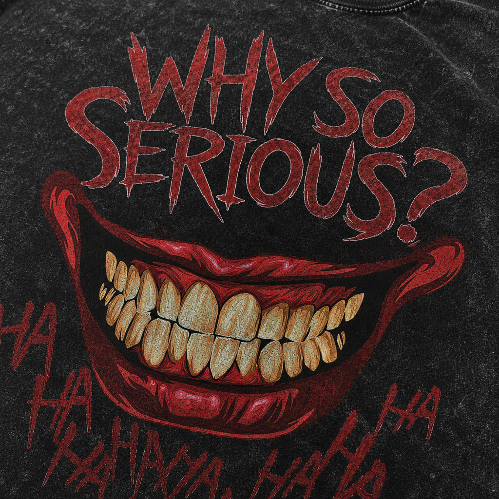 Close-up of Why So Serious Joker smile graphic with red lips, yellow teeth and distressed HA HA lettering