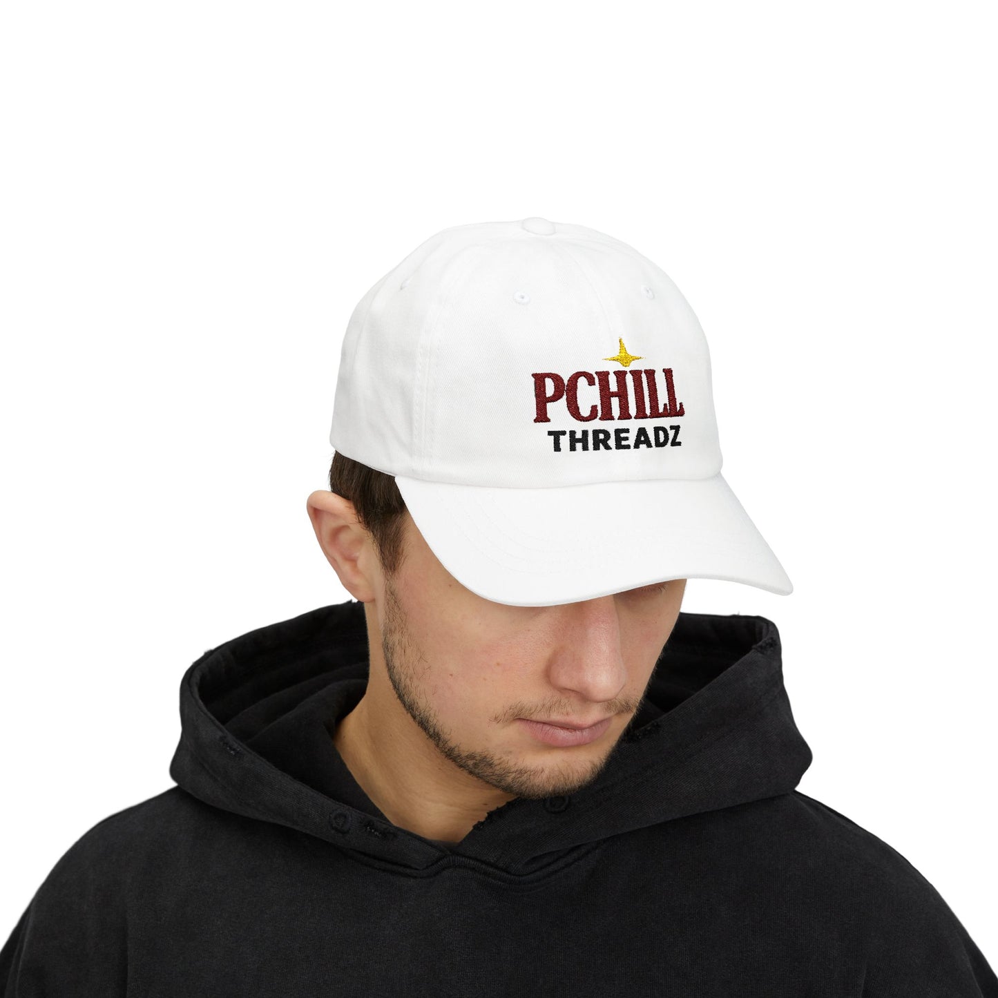 Person wearing a white cap with 'PCHILL THREADZ' logo on a white background