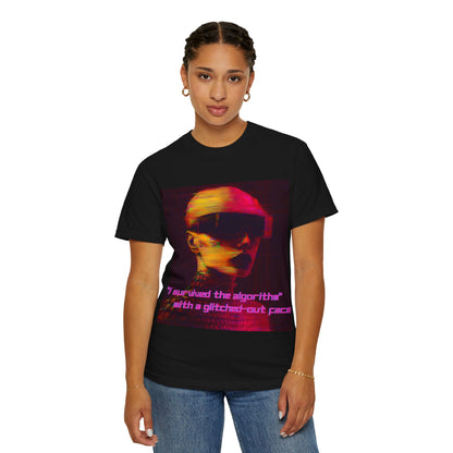 Woman wearing a black t-shirt with a glitchy neon portrait and bold pink text reading “I survived the algorithm.”