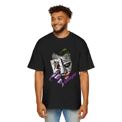 Man wearing a black t-shirt with a joker graphic design of a Joker card and face.