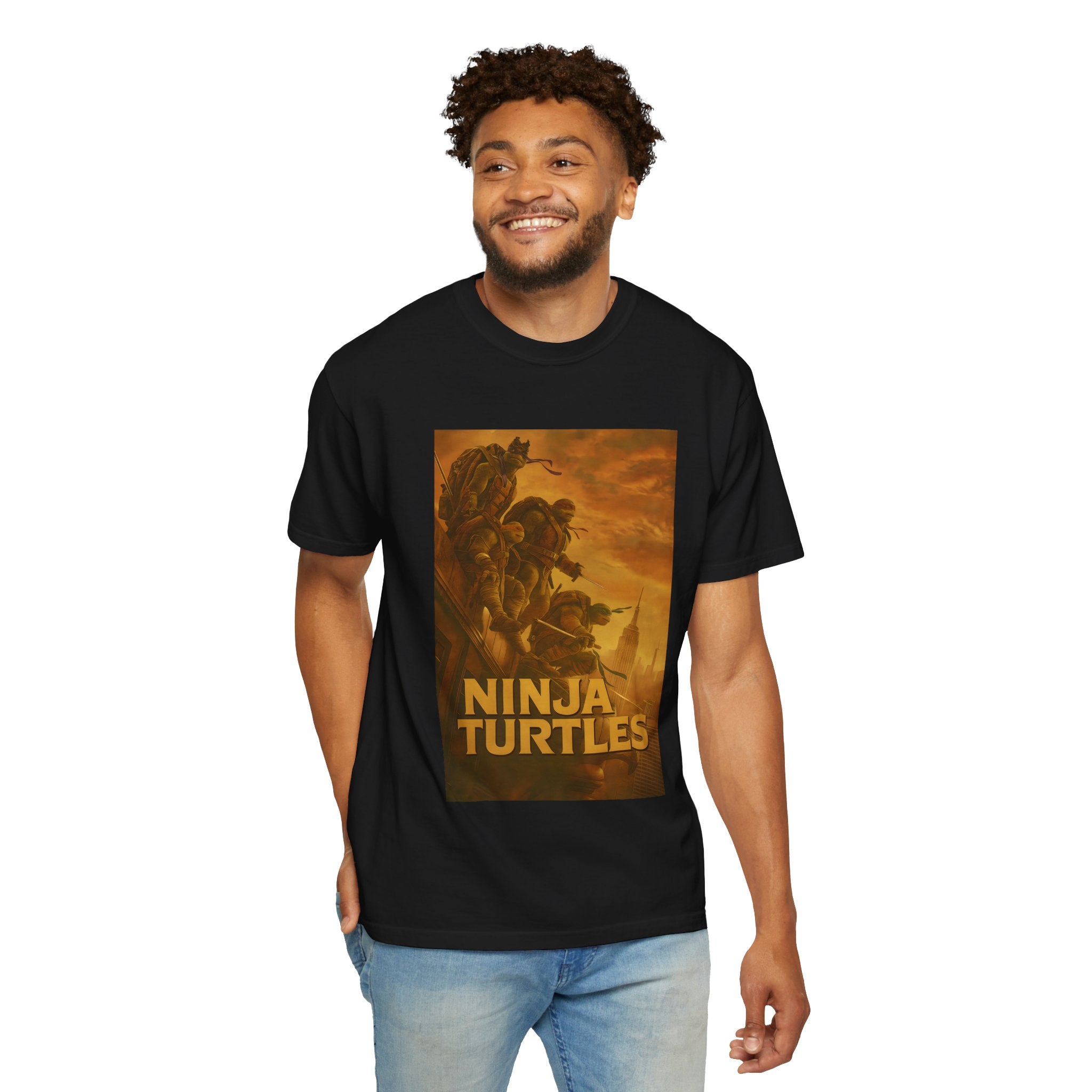 man wearing a black t-shirt with 'Ninja Turtles' graphic design on a white background