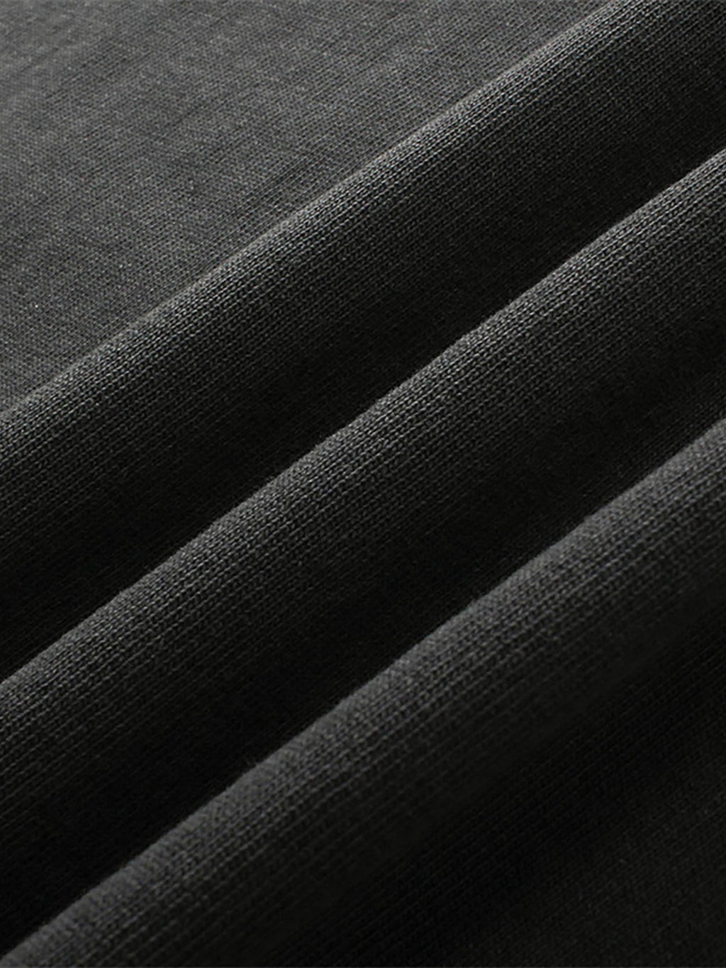 close up image of pchillthreadz vlack clothing fabric showcasing the quality and detail