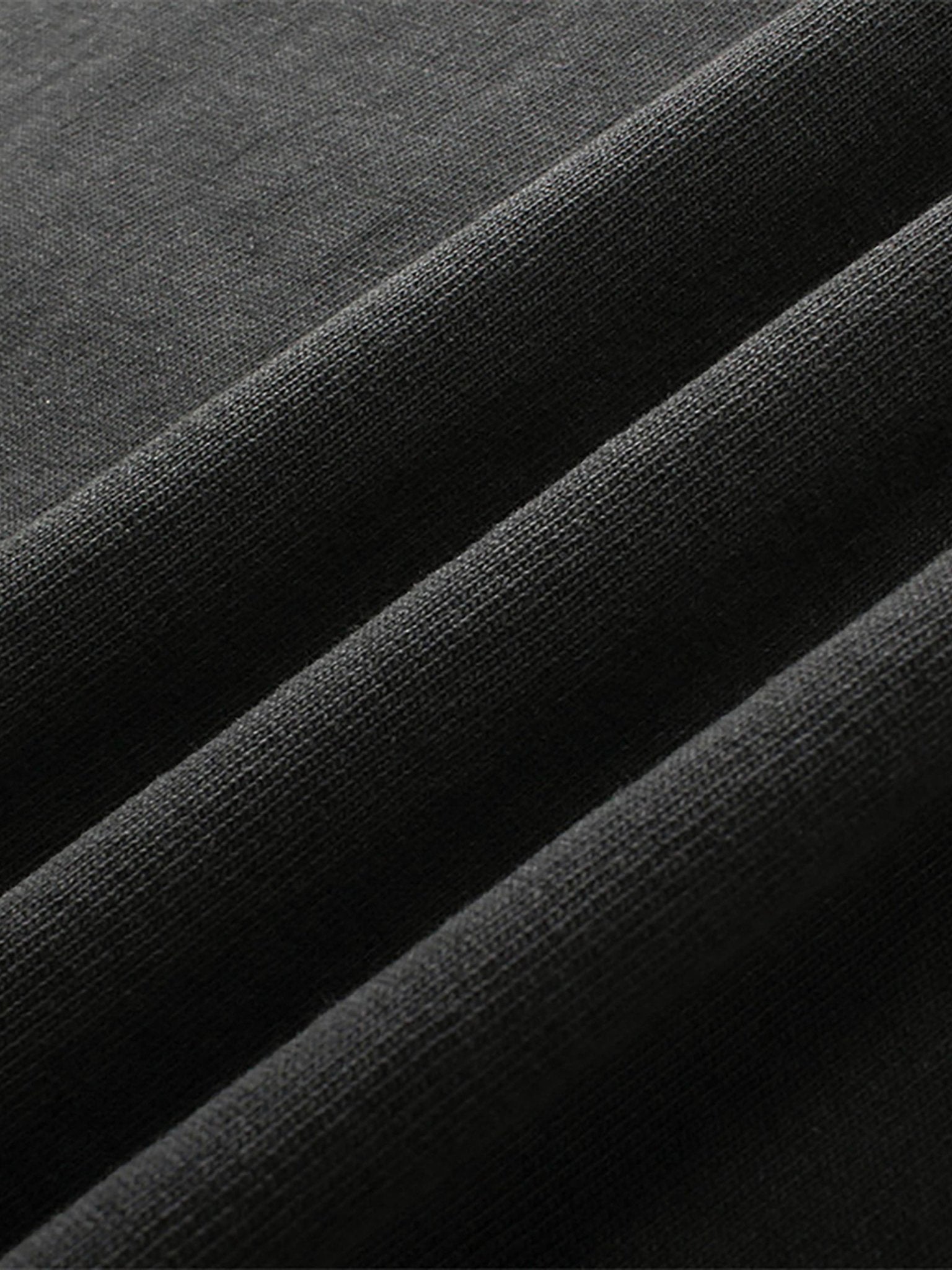 close up image of pchillthreadz vlack clothing fabric showcasing the quality and detail