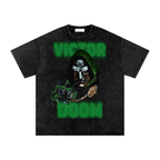 Washed-black oversized Doctor Doom T-shirt featuring Victor Doom in a metal mask and green hood with glowing green lettering.