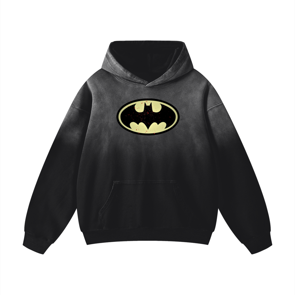Black hoodie with Batman logo in front of it on a white background