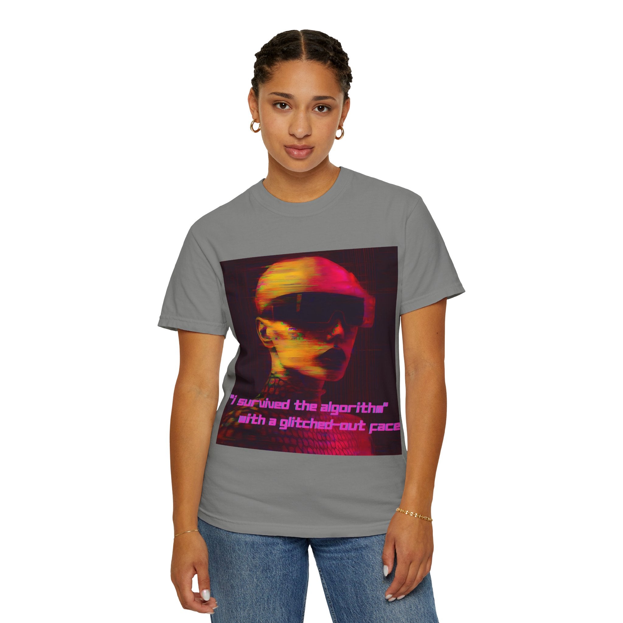Female model in gray t-shirt with bold digital art and distorted text that reads “I survived the algorithm” in pink neon.