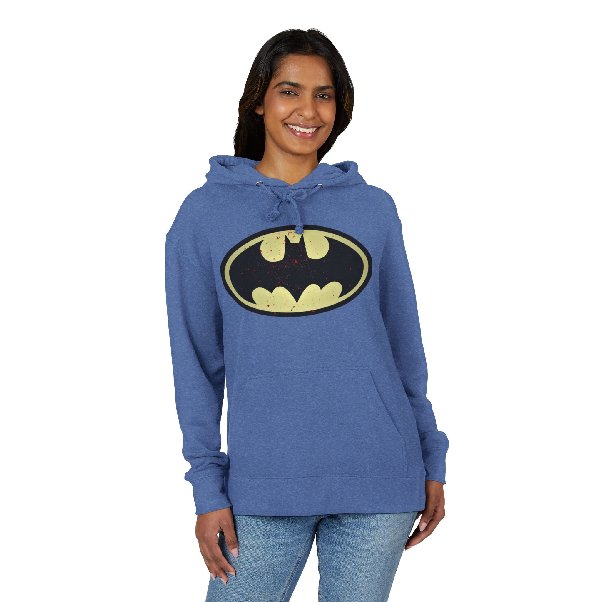 Woman wearing a heather royal hoodie with a Batman logo on a white background