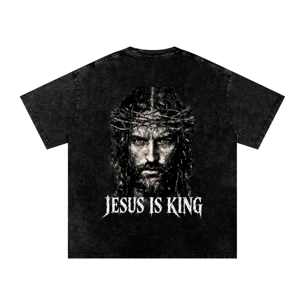 Back of black snow washed Jesus Is King graphic tee with Jesus crown of thorns portrait and distressed white lettering