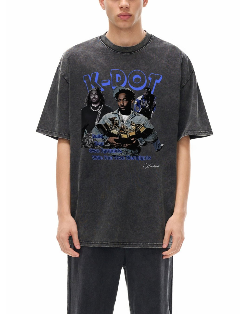 Person wearing a black t-shirt with graphic design of kdot on a white background