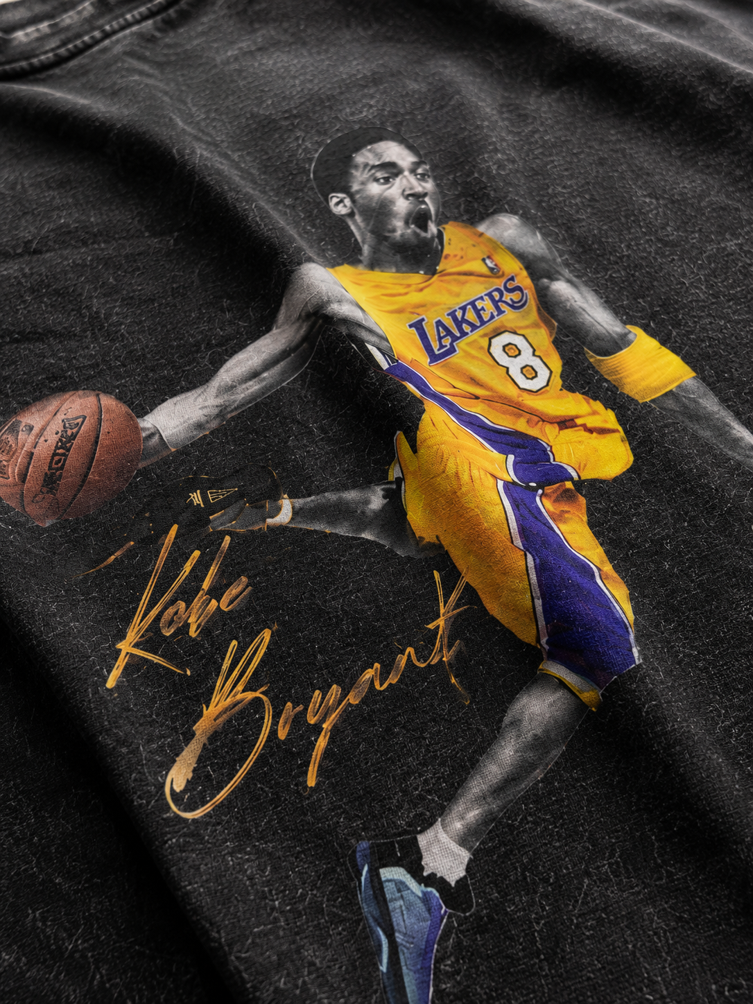 Close up of Kobe Bryant dunking graphic with Lakers No. 8 uniform basketball and gold Kobe Bryant signature