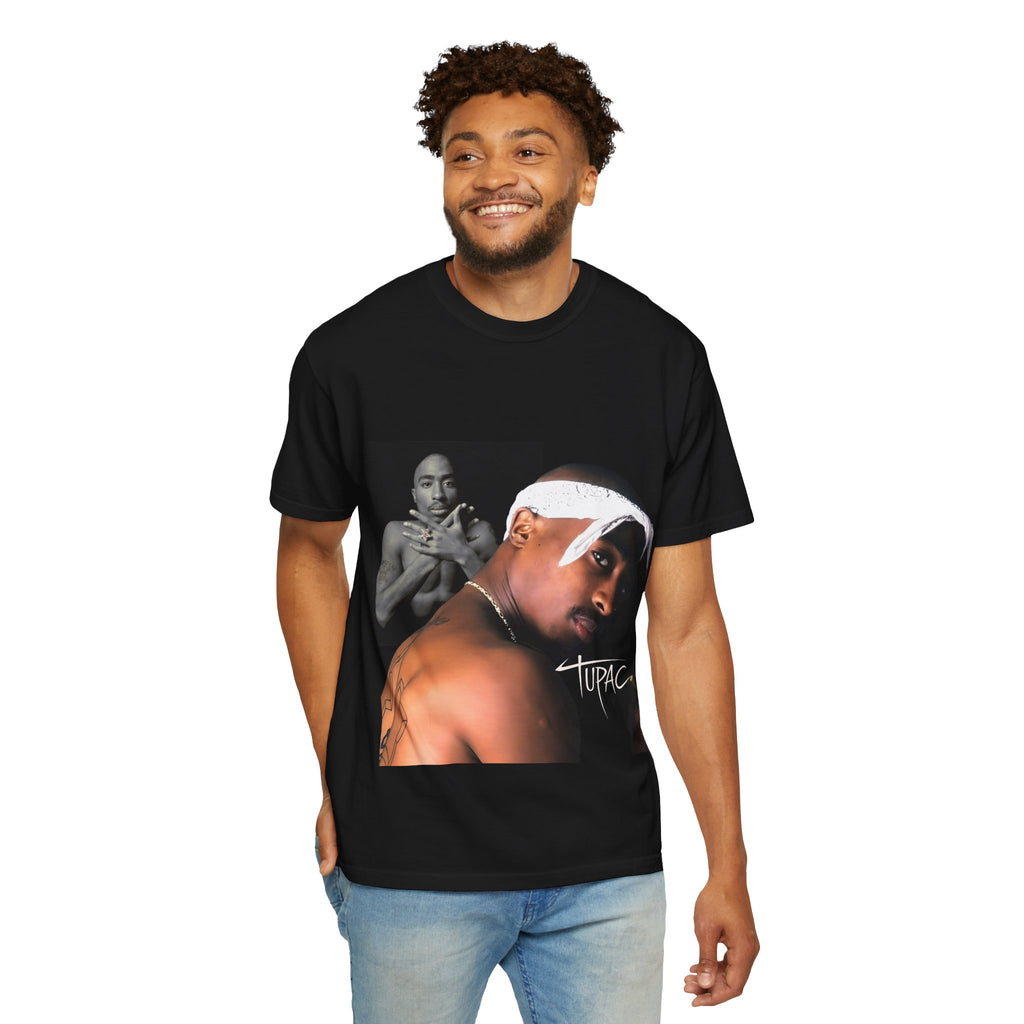 man wearing a black t-shirt with a graphic design on a white background