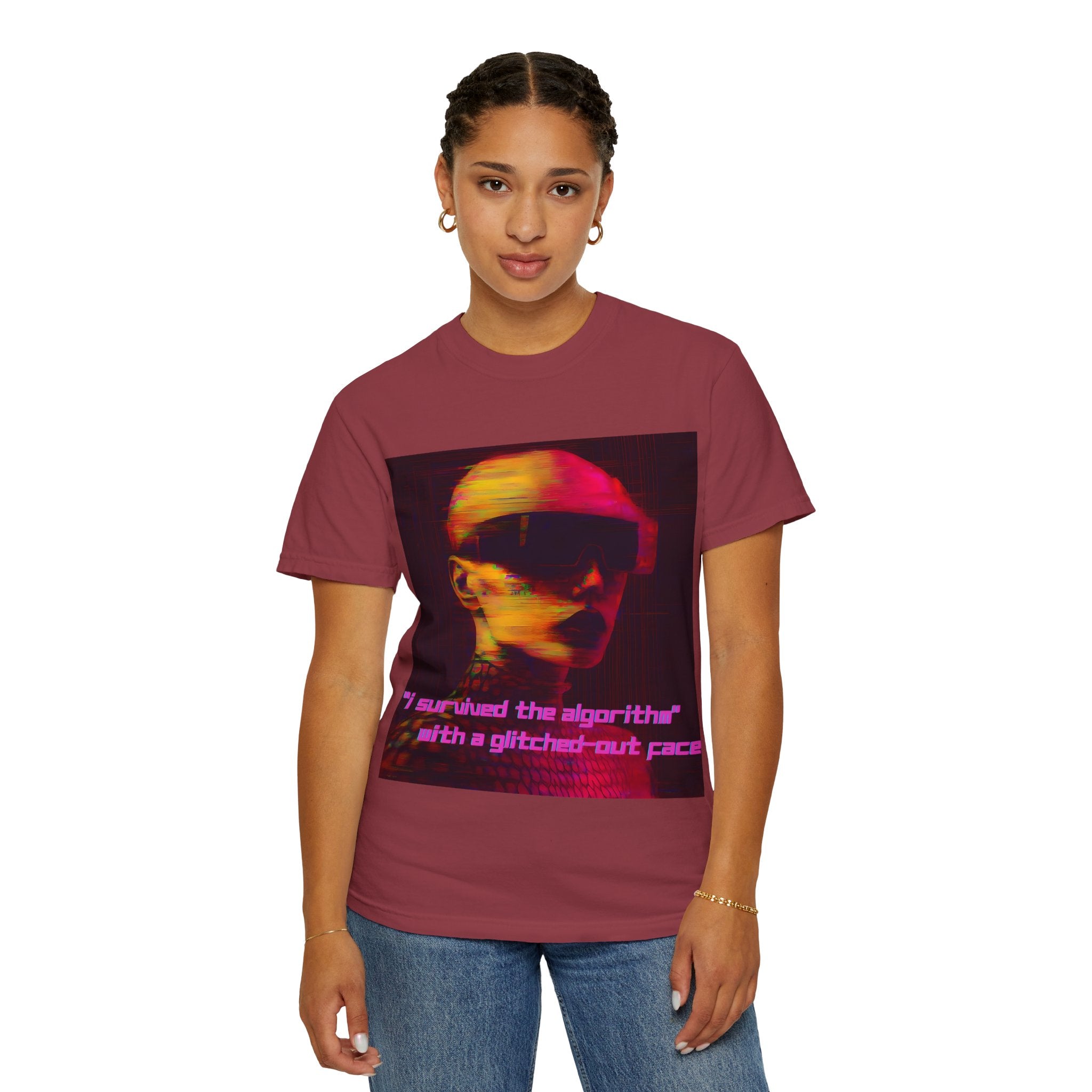 Model rocking a maroon t-shirt with bold sci-fi design and bright glitch-font text saying “I survived the algorithm