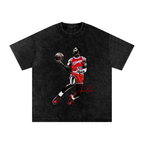 Michael Jordan dunking graphic tee featuring Jordan in red Chicago No. 23 basketball uniform on black snow washed t-shirt