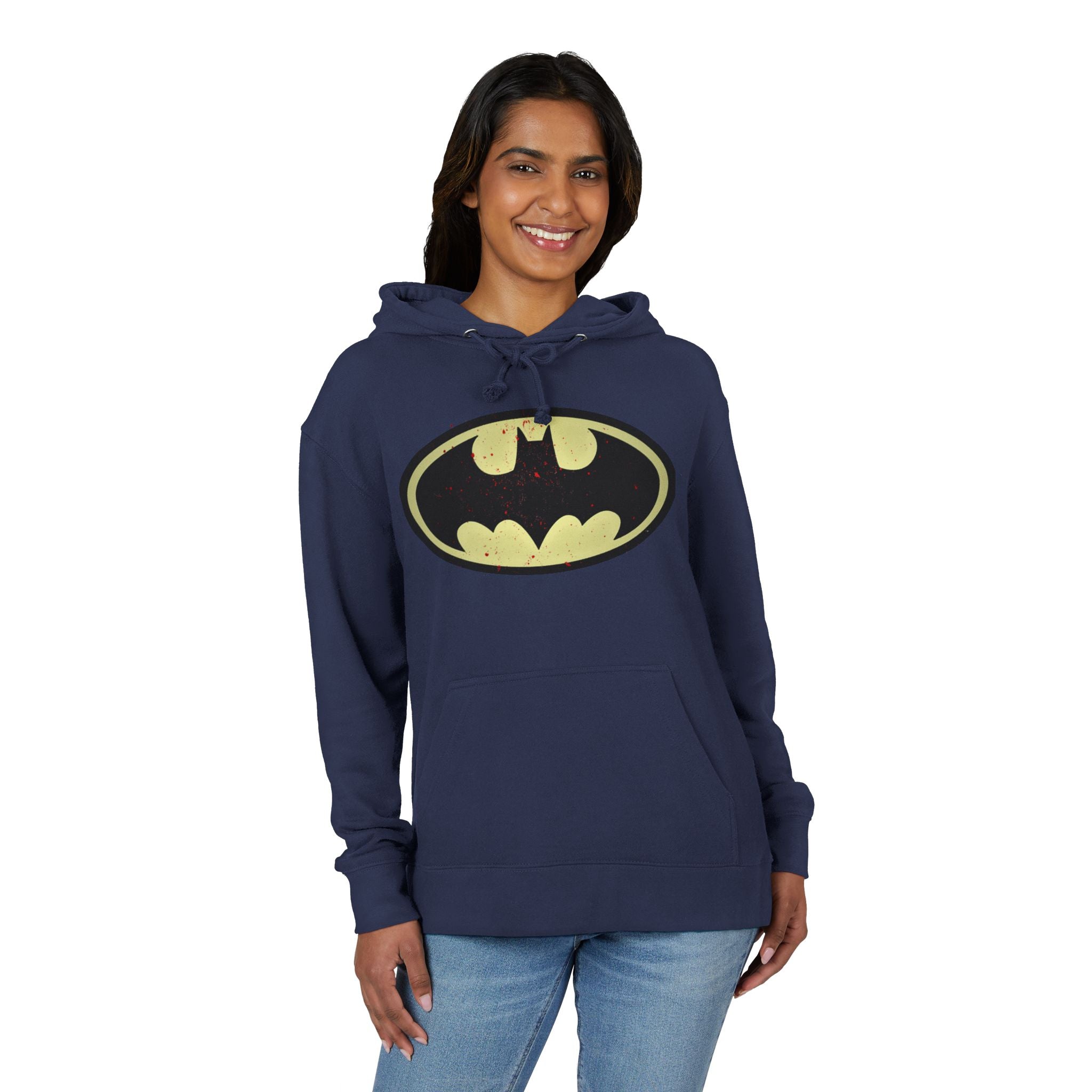 Woman wearing a navy blue hoodie with a Batman logo on a white background