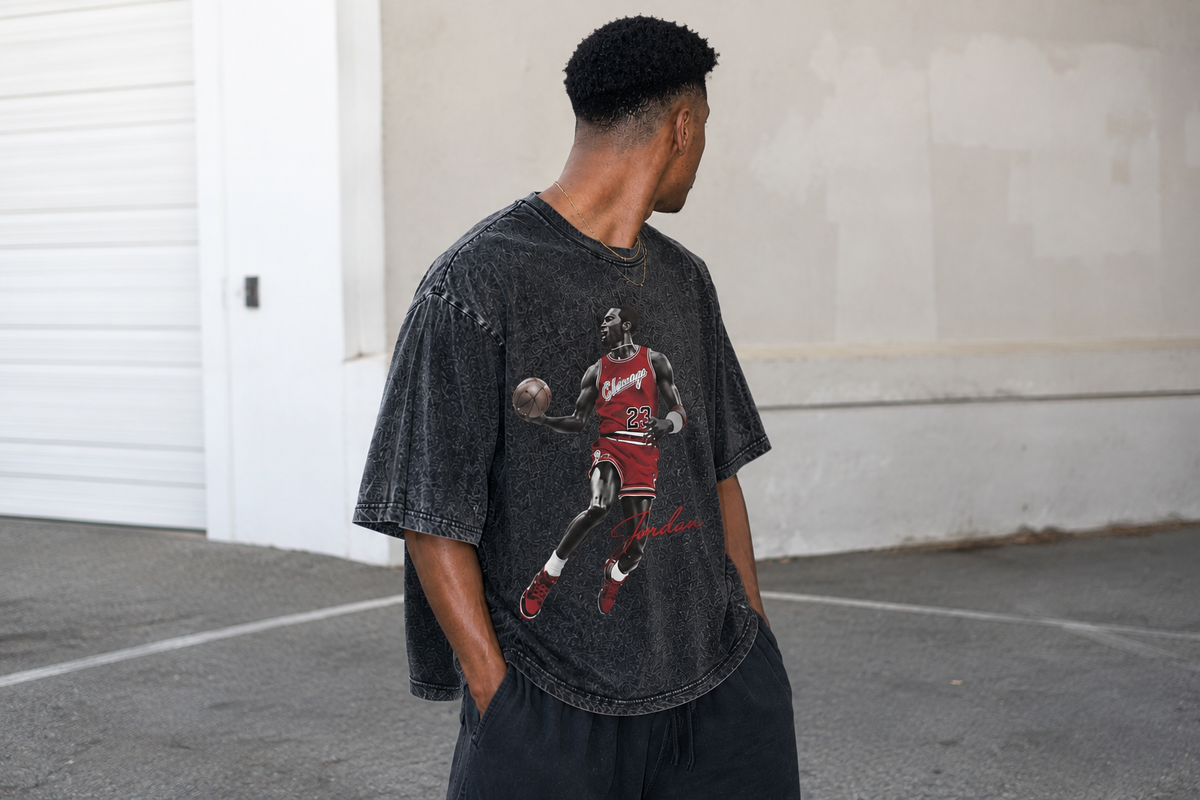 pchillthreadz stores background image of a man wearing a faded black graphic t-shirt featuring a Michael Jordan Chicago Bulls print