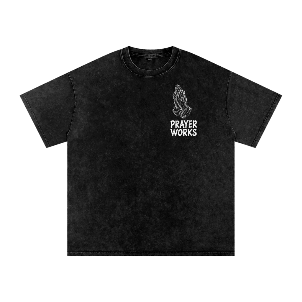 Prayer Works Christian graphic tee with praying hands and distressed white lettering on black snow washed T-shirt
