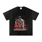 Washed-black oversized Ronnie Coleman T-shirt featuring the bodybuilder in a red crown and cape above a motivational quote.