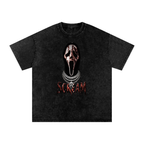 Black snow-washed Scream graphic tee featuring a blood-splattered Ghostface mask in a black hood, layered silver chains and distressed red Scream lettering.