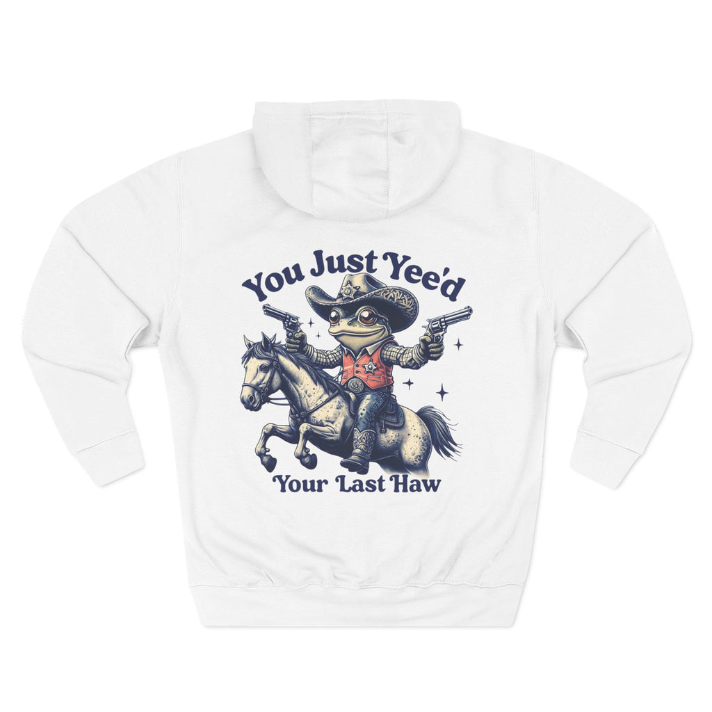 White cowboy hoodie with a graphic of a frog in a cowboy hat riding a horse, holding guns, and texts