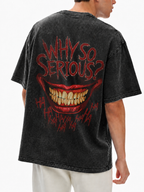 Black snow-washed Joker graphic t-shirt featuring large Why So Serious smile design on back