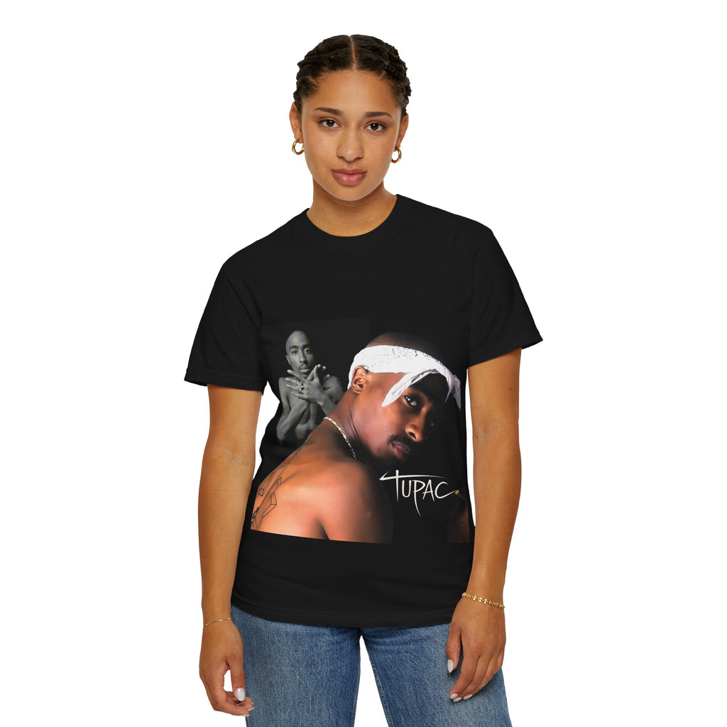 woman wearing a black t-shirt with a graphic of a well-known figure and the name 'Tupac'.
